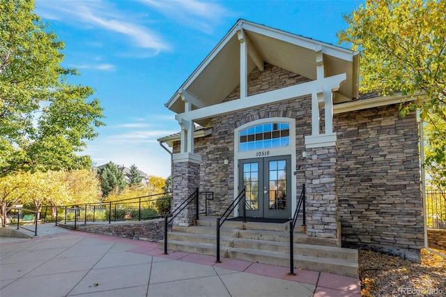 entrance to property featuring french doors