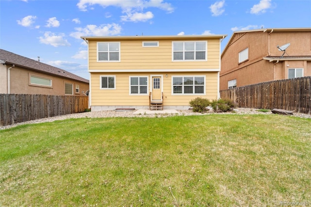 back of property featuring entry steps