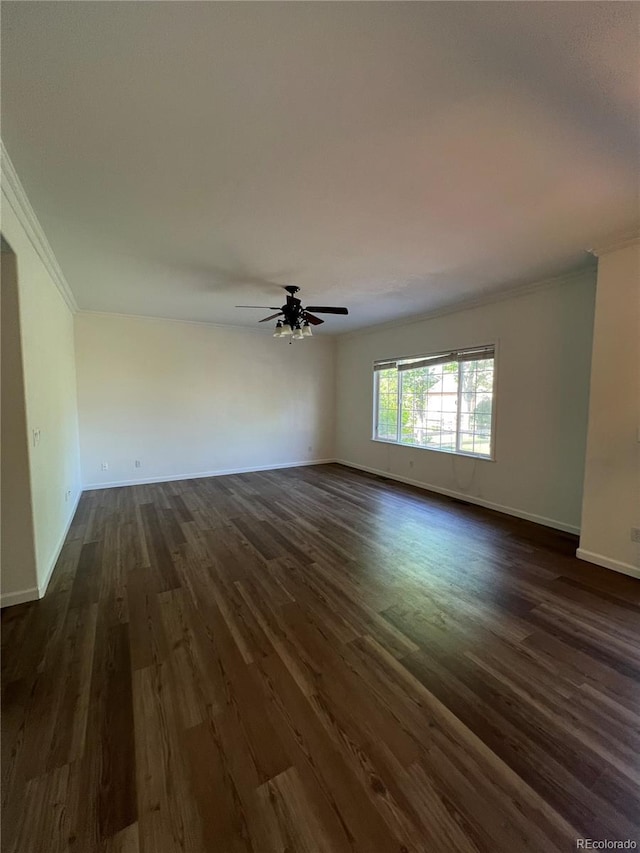 unfurnished room with ceiling fan, dark hardwood / wood-style flooring, and crown molding