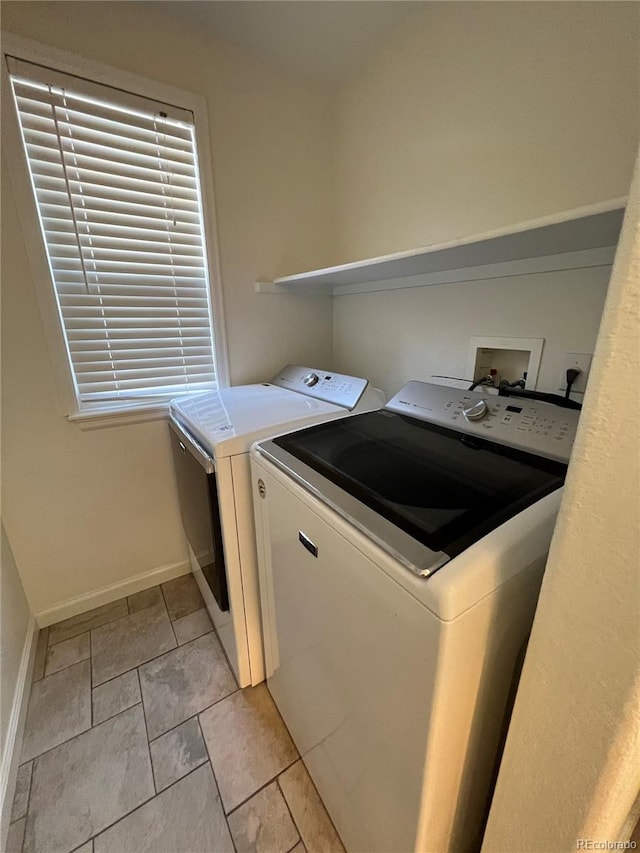 laundry room featuring independent washer and dryer