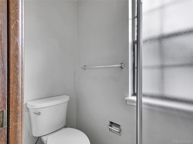 bathroom featuring toilet