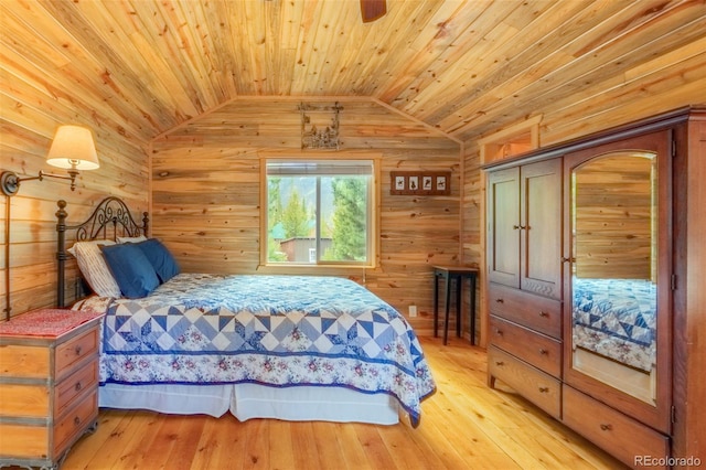 1450 Pine Ln Unit A, Grand Lake, CO 80447 - bedroom with vaulted ceiling, wood ceiling, light wood finished floors, and wood walls