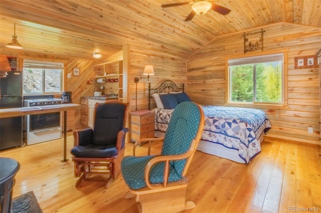 1450 Pine Ln Unit A, Grand Lake, CO 80447 - bedroom featuring lofted ceiling, multiple windows, wood-type flooring, wooden ceiling, and wood walls