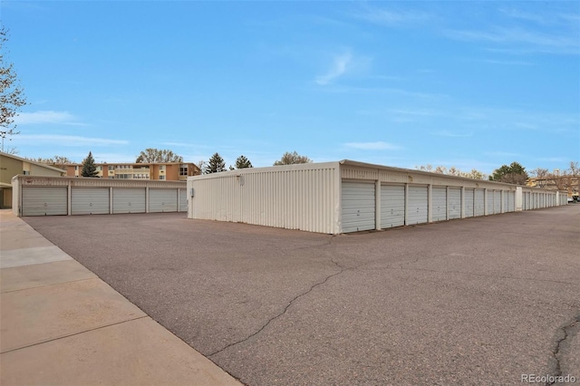 garage with fence