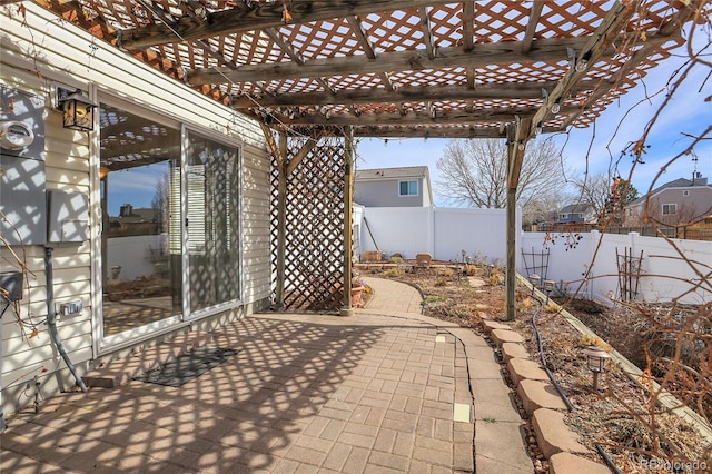 view of patio with a fenced backyard and a pergola