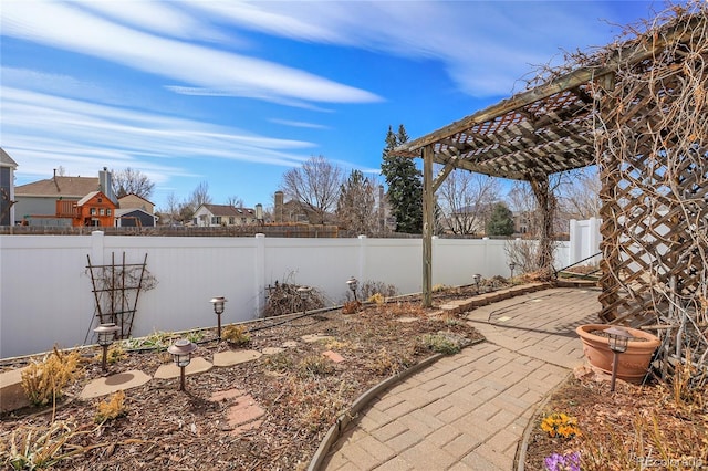 view of yard featuring a patio area and a fenced backyard