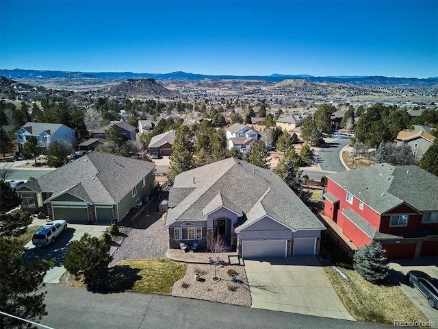 bird's eye view with a mountain view and a residential view