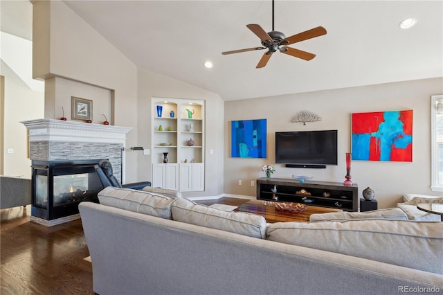 living room with lofted ceiling, built in shelves, recessed lighting, a multi sided fireplace, and dark wood finished floors