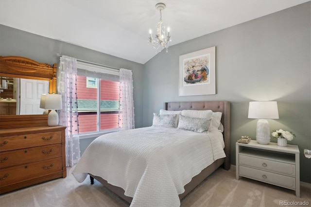 bedroom with lofted ceiling, light carpet, a notable chandelier, and baseboards