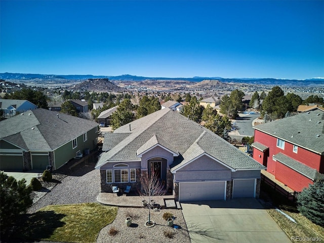 bird's eye view featuring a residential view and a mountain view