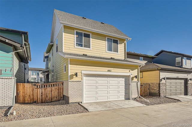 view of front of property featuring a garage