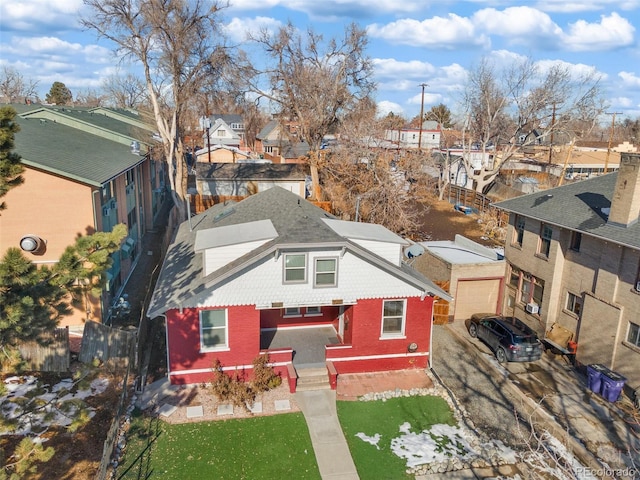 birds eye view of property with a residential view