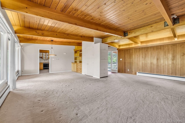 1 Lindenwood Dr, Littleton, CO 80120 - spare room with a wooden ceiling with exposed beams, a baseboard heating unit, light carpet, wood walls, and baseboard heating