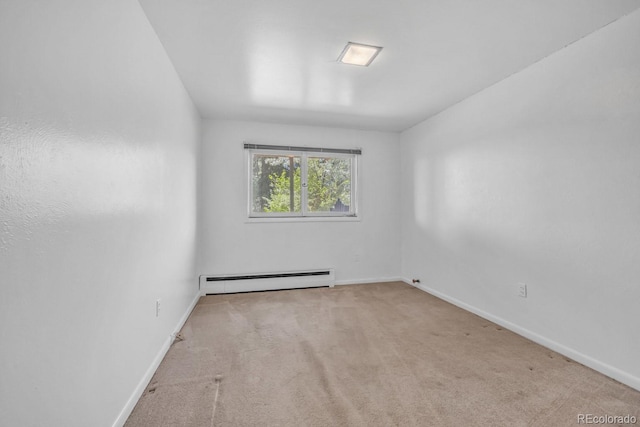 1 Lindenwood Dr, Littleton, CO 80120 - carpeted empty room featuring a baseboard radiator and baseboards