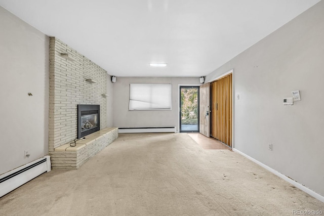 1 Lindenwood Dr, Littleton, CO 80120 - unfurnished living room with a baseboard heating unit, carpet floors, and a brick fireplace