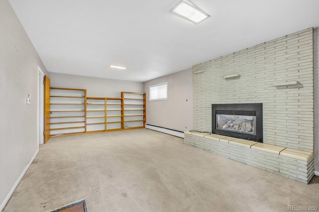 1 Lindenwood Dr, Littleton, CO 80120 - unfurnished living room featuring a baseboard heating unit, carpet, and a brick fireplace