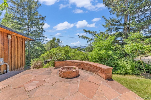 1 Lindenwood Dr, Littleton, CO 80120 - view of patio / terrace with a fire pit