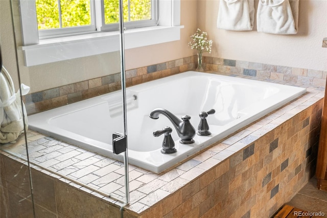 8029 E 23rd Ave, Denver, CO 80238 - bathroom featuring a garden tub