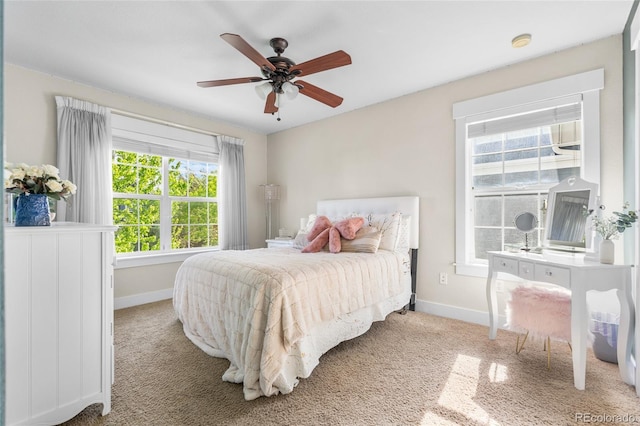 8029 E 23rd Ave, Denver, CO 80238 - bedroom with baseboards, carpet flooring, and ceiling fan
