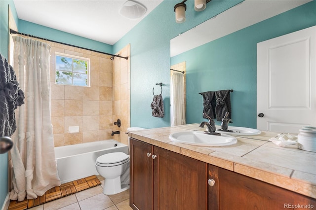 8029 E 23rd Ave, Denver, CO 80238 - full bathroom featuring vanity, shower / tub combo, toilet, and tile patterned flooring