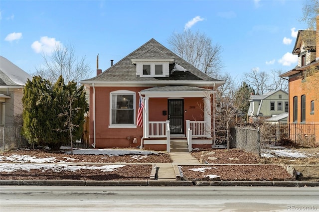 bungalow-style house featuring covered porch