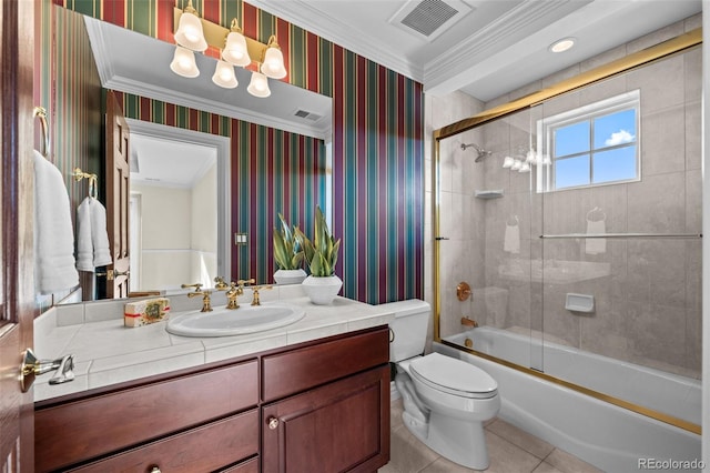 full bathroom with toilet, shower / bath combination with glass door, ornamental molding, vanity, and tile patterned flooring