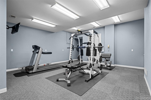 exercise room featuring carpet