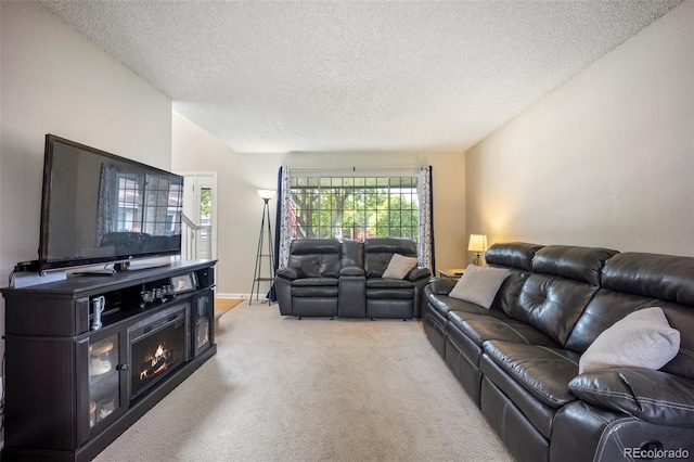 5552 S Lisbon Ln, Centennial, CO 80015 - living area with light colored carpet and a textured ceiling
