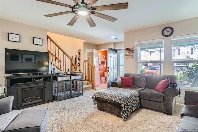 17390 Waterhouse Cir Unit B, Parker, CO 80134 - carpeted living area featuring stairs and ceiling fan