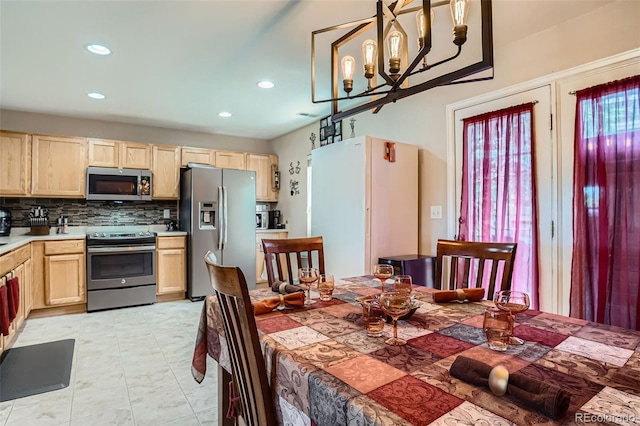 17390 Waterhouse Cir Unit B, Parker, CO 80134 - dining space with recessed lighting and a chandelier