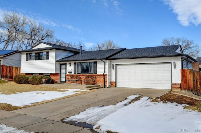 split level home with a garage