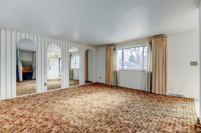 unfurnished bedroom featuring carpet flooring