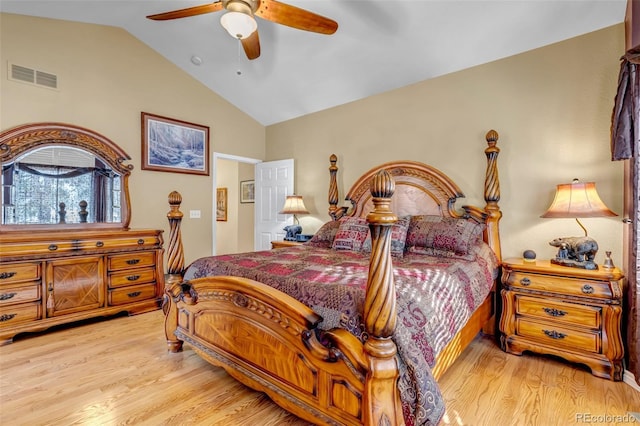 bedroom with ceiling fan, lofted ceiling, and light hardwood / wood-style flooring