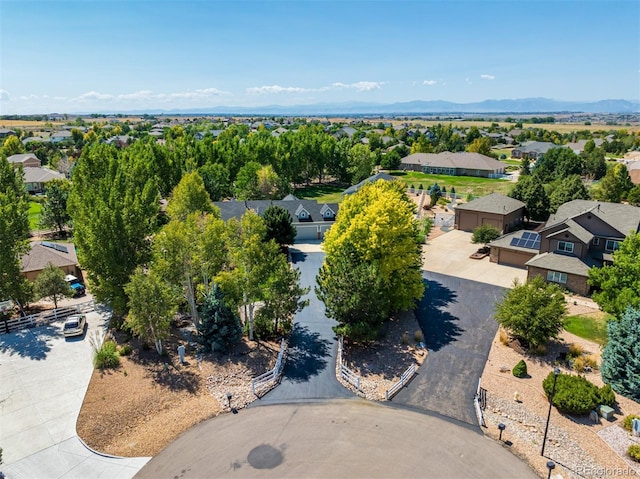 birds eye view of property featuring a mountain view