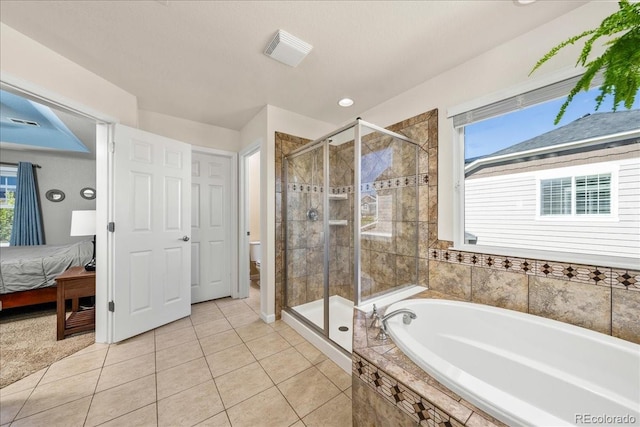 bathroom featuring a bath, toilet, ensuite bath, and a stall shower