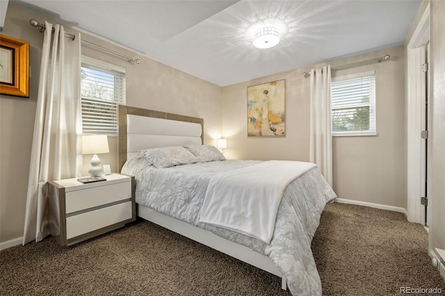 6854 S Willow St, Centennial, CO 80112 - bedroom with baseboards and dark colored carpet