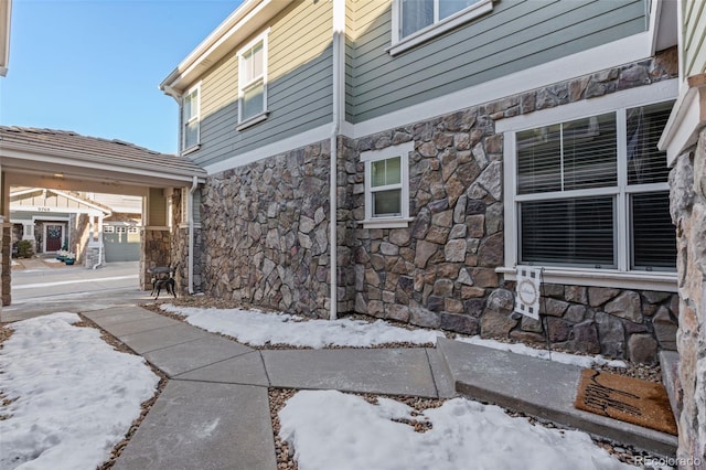 view of snow covered property