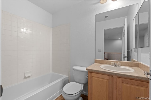 full bathroom featuring toilet, shower / tub combination, and vanity