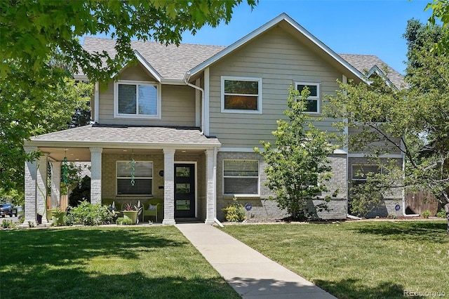 751 Poplar St, Denver, CO 80220 - view of front of property featuring a shingled roof, a front lawn, and a porch