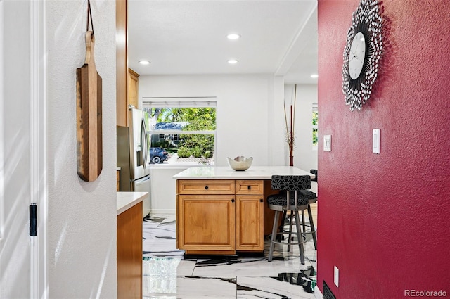 751 Poplar St, Denver, CO 80220 - bar area with light marble finish floors, recessed lighting, and stainless steel fridge with ice dispenser