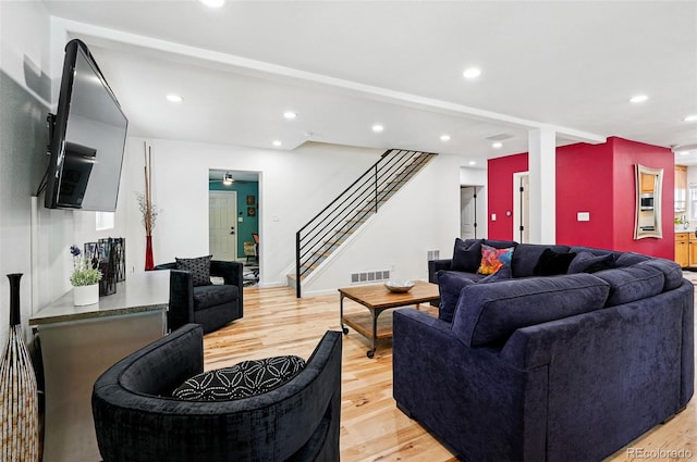 751 Poplar St, Denver, CO 80220 - living room with light wood-style flooring, stairway, and recessed lighting