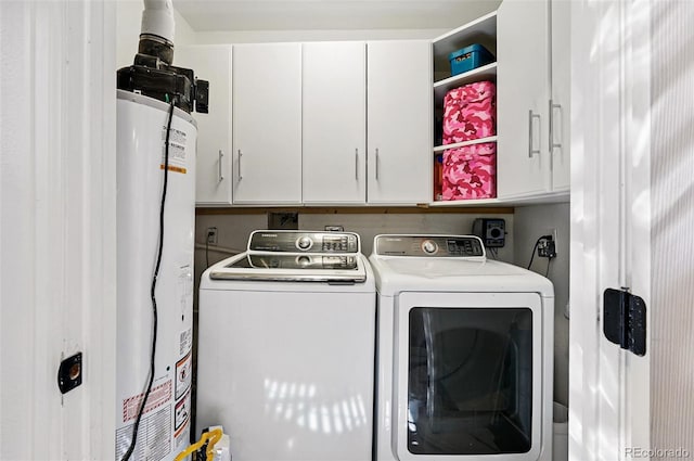 751 Poplar St, Denver, CO 80220 - washroom with washer and dryer, cabinet space, and water heater