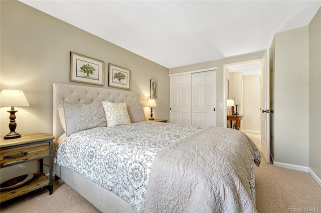 carpeted bedroom featuring a closet