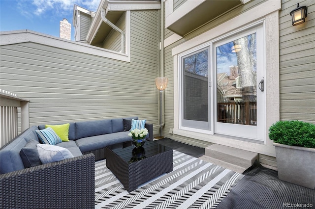 wooden deck with outdoor lounge area