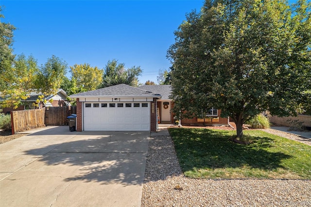 ranch-style home featuring a garage