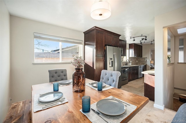 dining space with sink