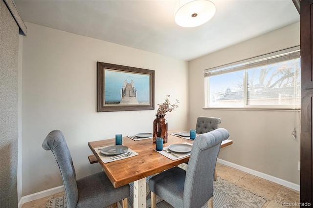 dining room with light tile patterned floors