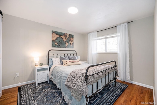 bedroom featuring hardwood / wood-style floors