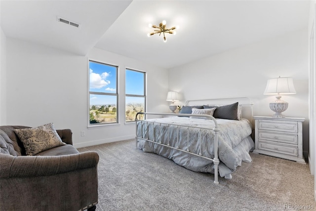 bedroom featuring visible vents, baseboards, and carpet flooring