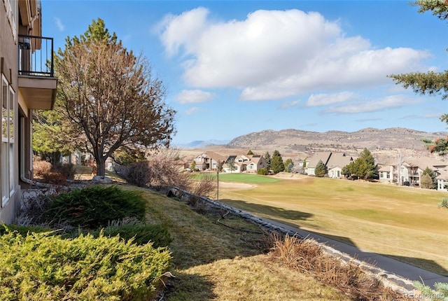 exterior space featuring a mountain view and a residential view